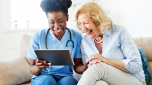 Reviewing their health information on a tablet.